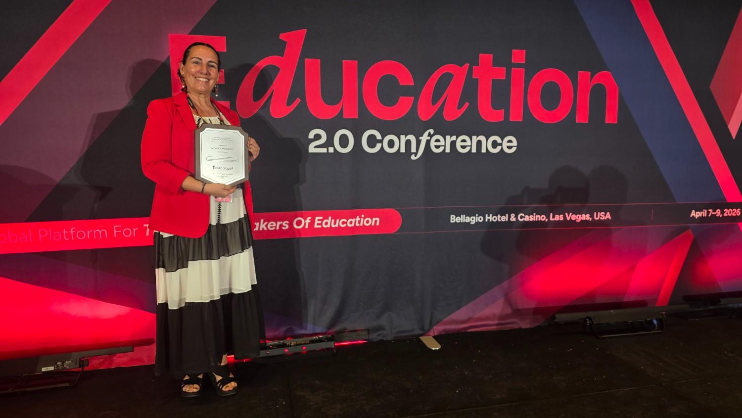 Proudly holding the Excellence in Education Award in Las Vegas